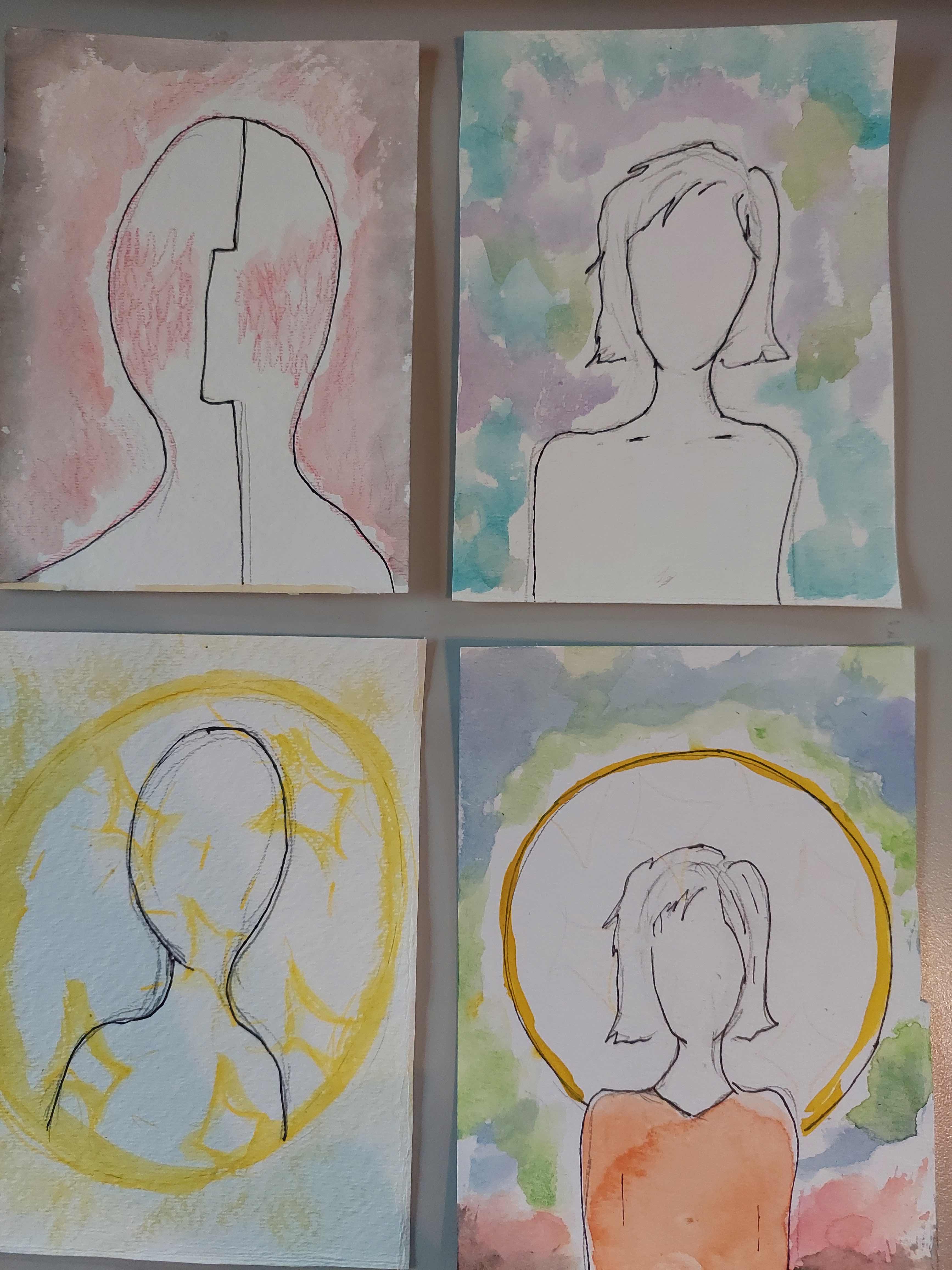 Hands working with art materials during a therapy session